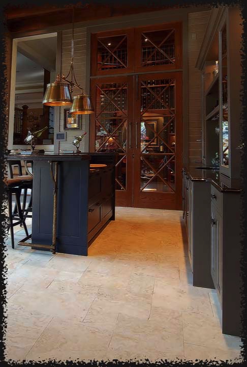 This wine room on the main floor, next to a bar was added during a renovation / addition.