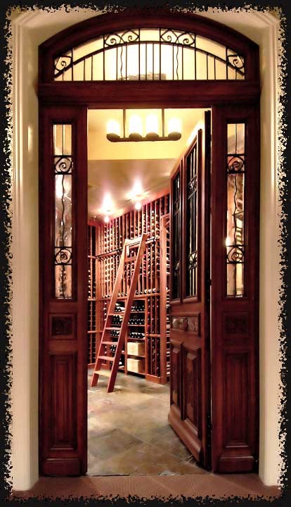 The entrance to this room is highlighted by a 19th century door and transom window.  The door was completely refurbished, the metalwork sandblasted and repainted, and new double-glazed panes were made and installed.