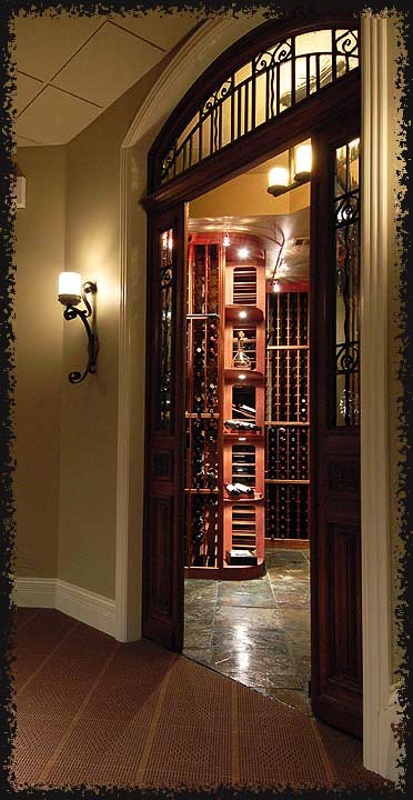 A second view of the entryway showing the built-in low voltage lights in the corner display shelves.