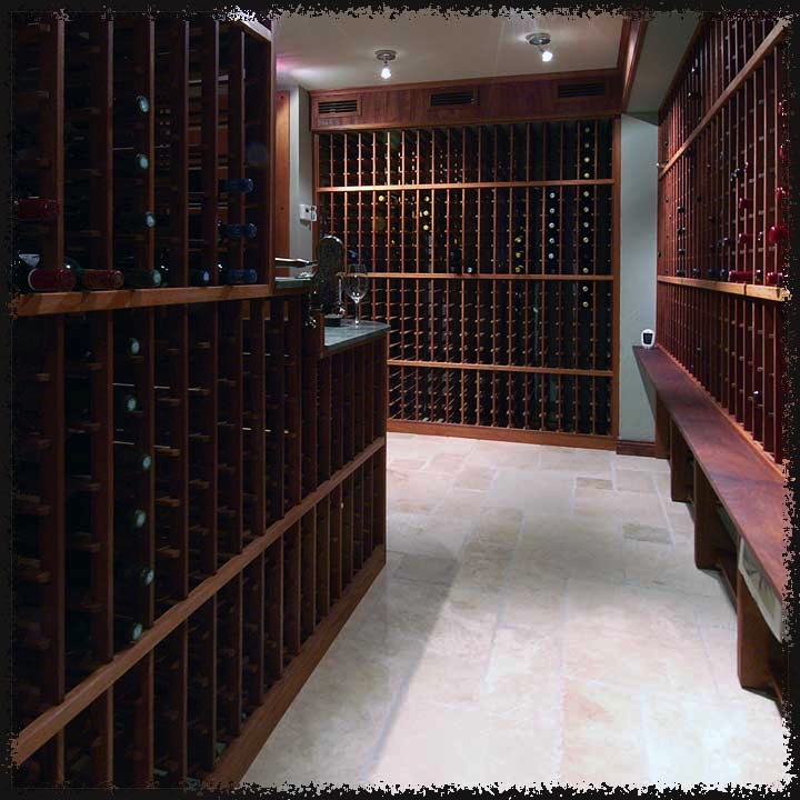 Soffits are surfaced with the same solid mahogany as the rack millwork, including the supply air grills.