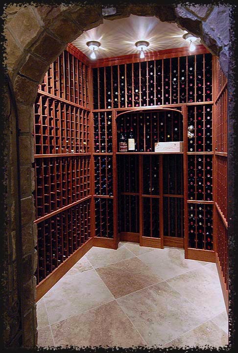 Racks are double-deep except for the decorative recess that allows for a work surface.  Lighting is surface-mounted owing to construction constraints.