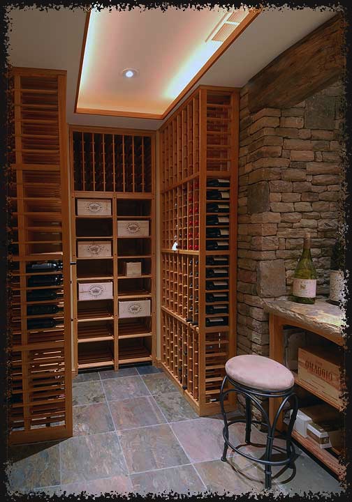 Case and magnum storage are provided at one end of the room.