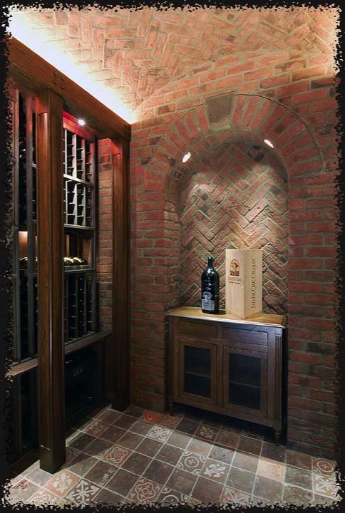 Placement for spot lights were drilled into the arch in the niche to light the cabinet.