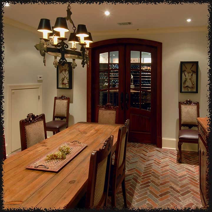 This wine room is directly adjacent to a tasting and entertainment room, just beyond the double doors. 