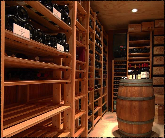 Shelves can be repositioned at any time to store, a single row of 750s, magnums, or a double row of 750s.