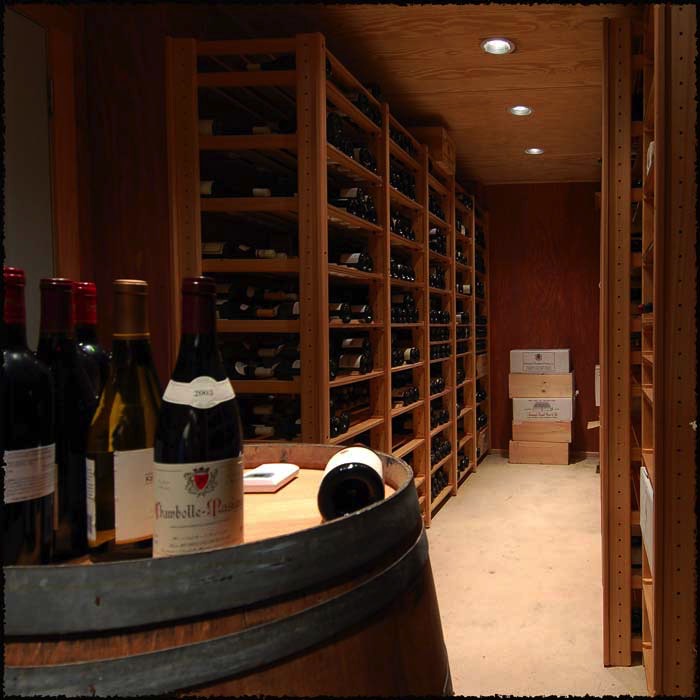 A refurbished wine barrel serves as a simple workspace.